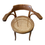 Bistro chair with a curved wooden frame and caned seat from the 1930s.