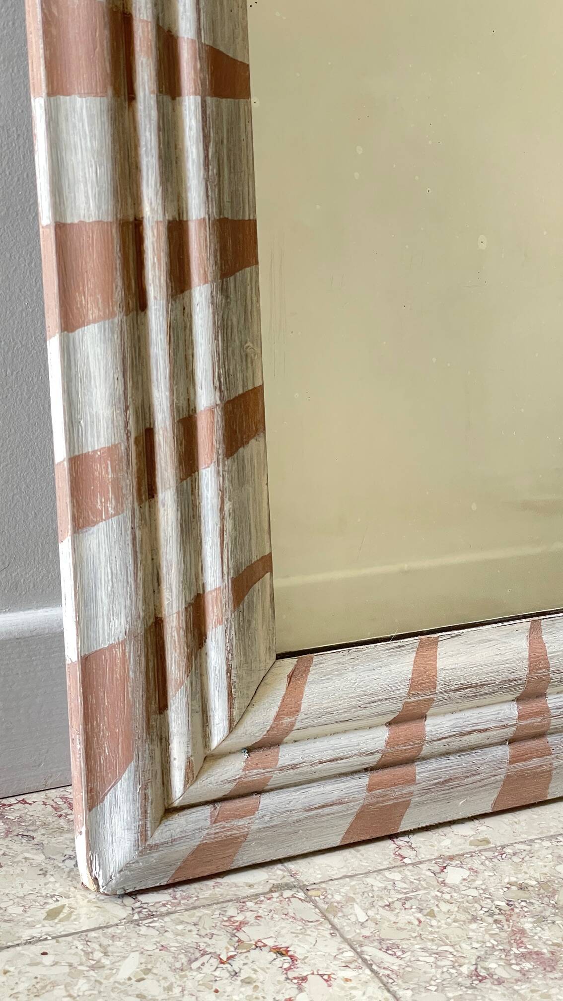 Old mirror in hand-painted wood