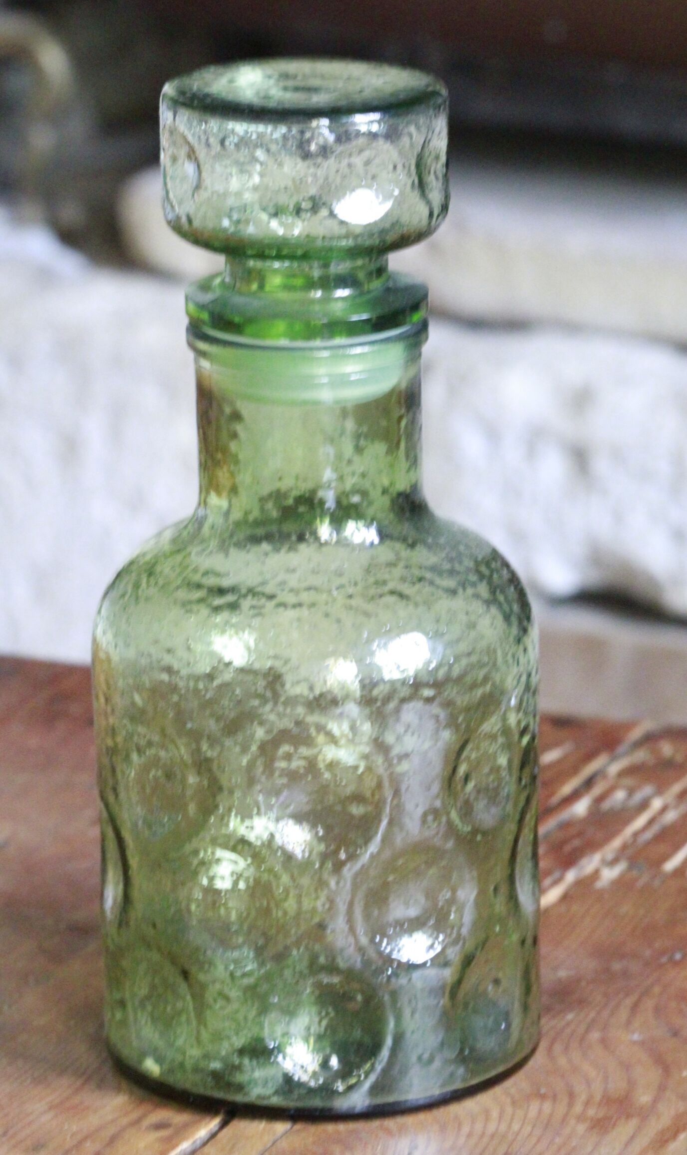 Green bottle made of old glass
