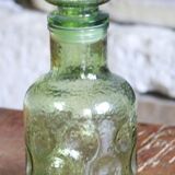 Green bottle made of old glass