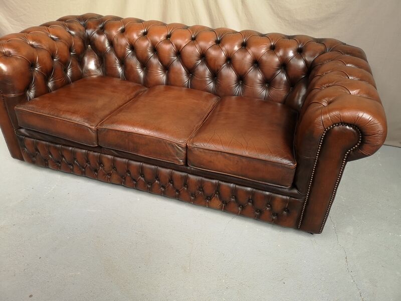Brown leather chesterfield sofa