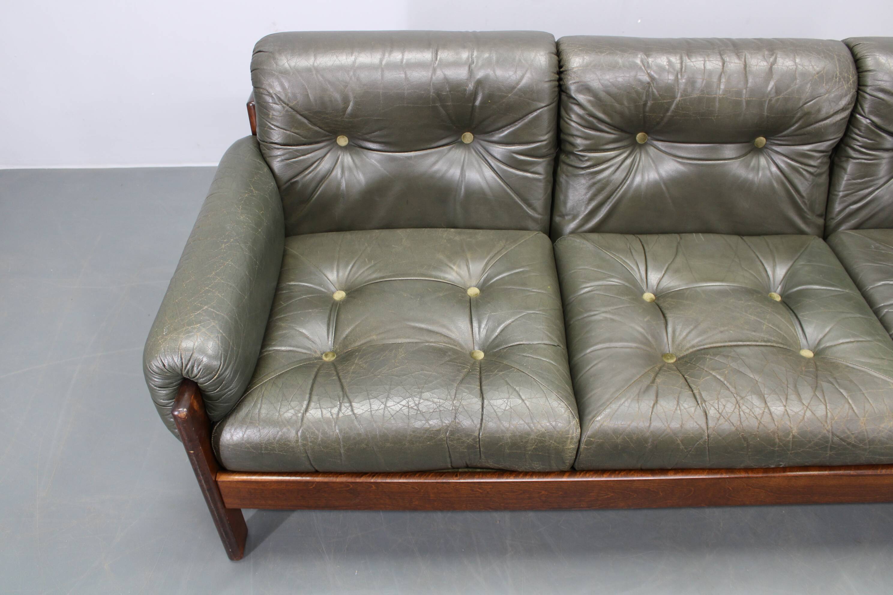Mid-century Czechoslovak green leather sofa, 1970s
