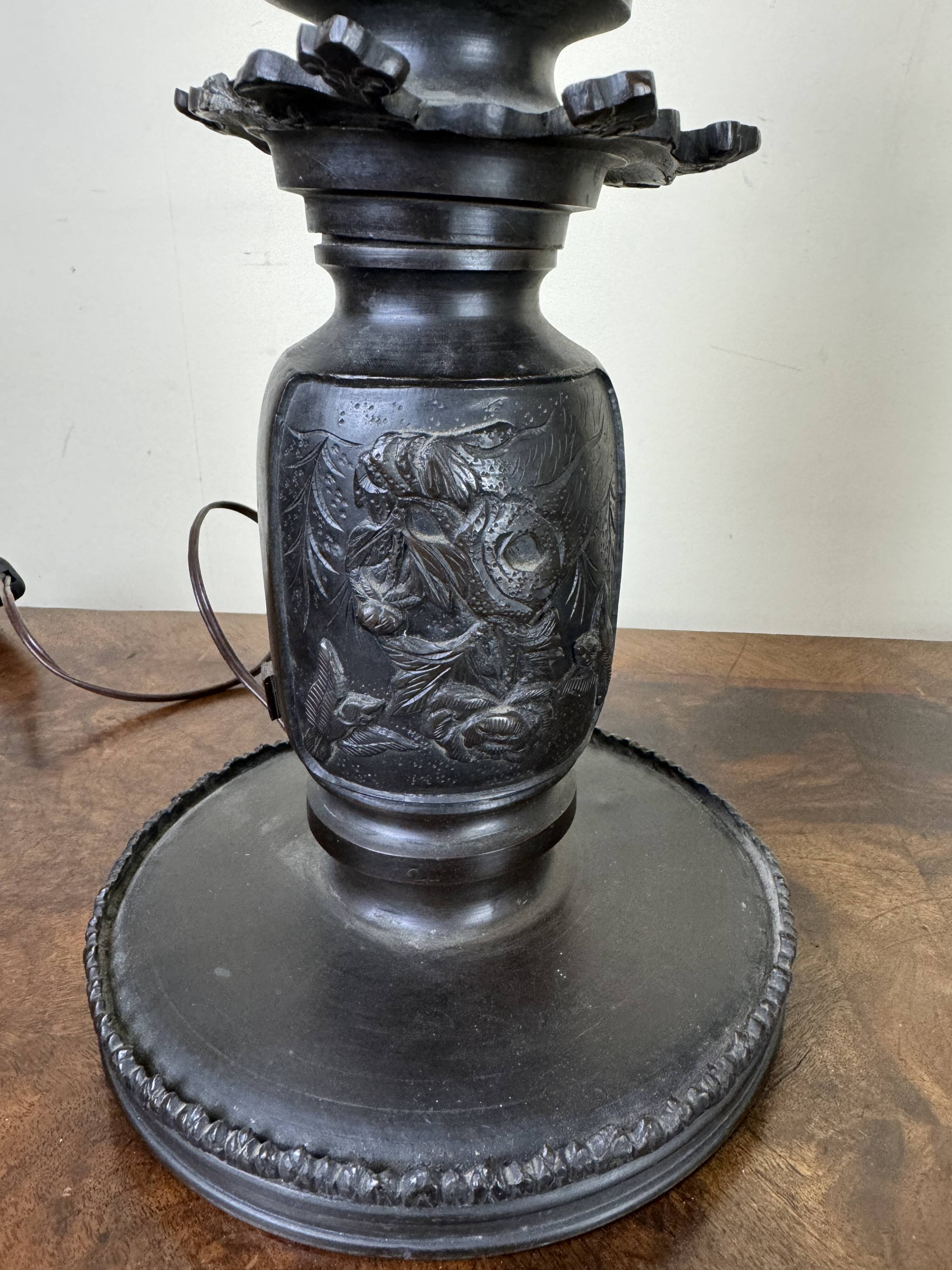 Japan Meiji period: Pair of patinated bronze candlesticks circa 1880