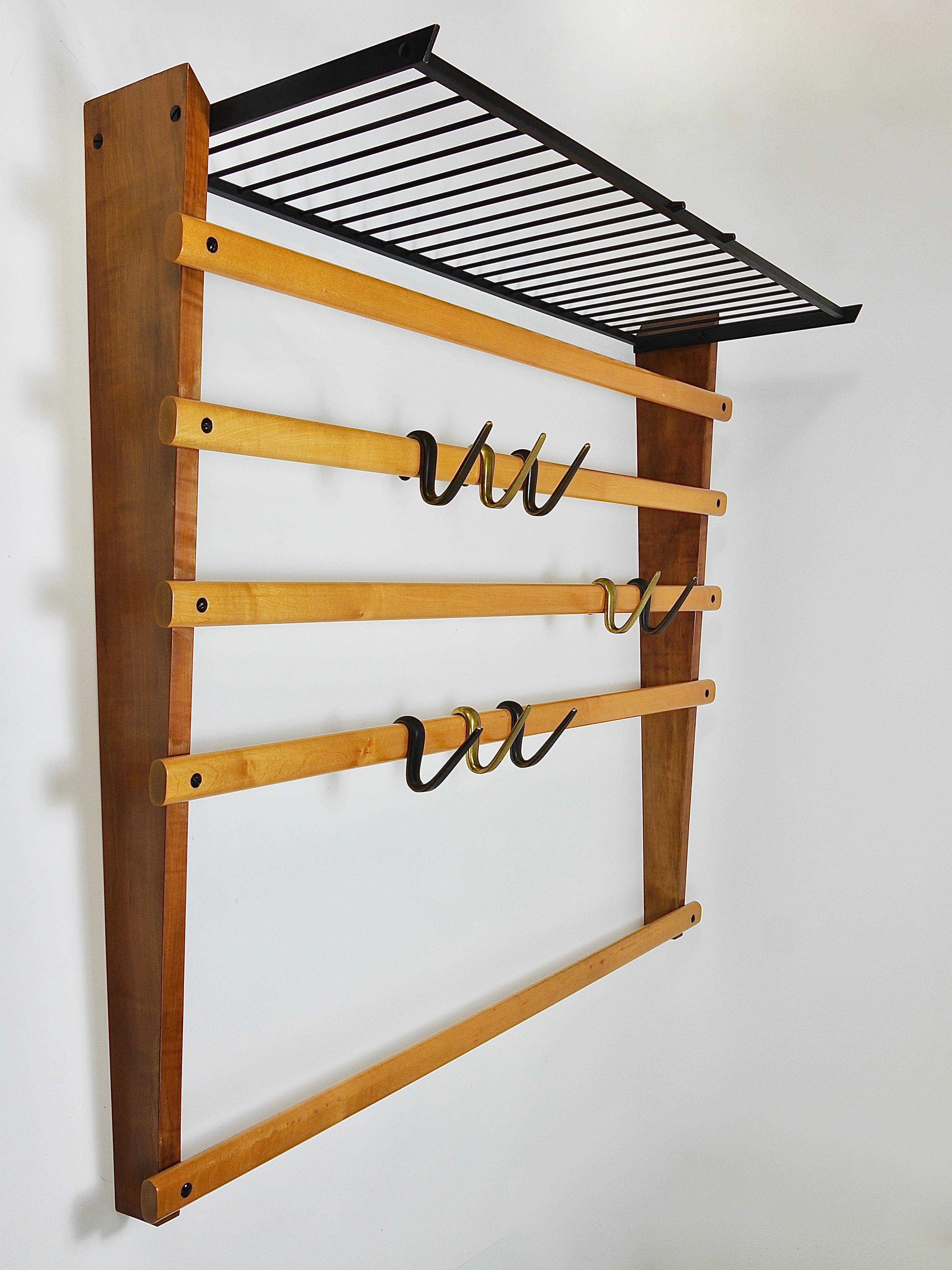 Rare coat rack by Carl Auböck with hat rack, cabinet, brass, walnut and beech, 1950s.