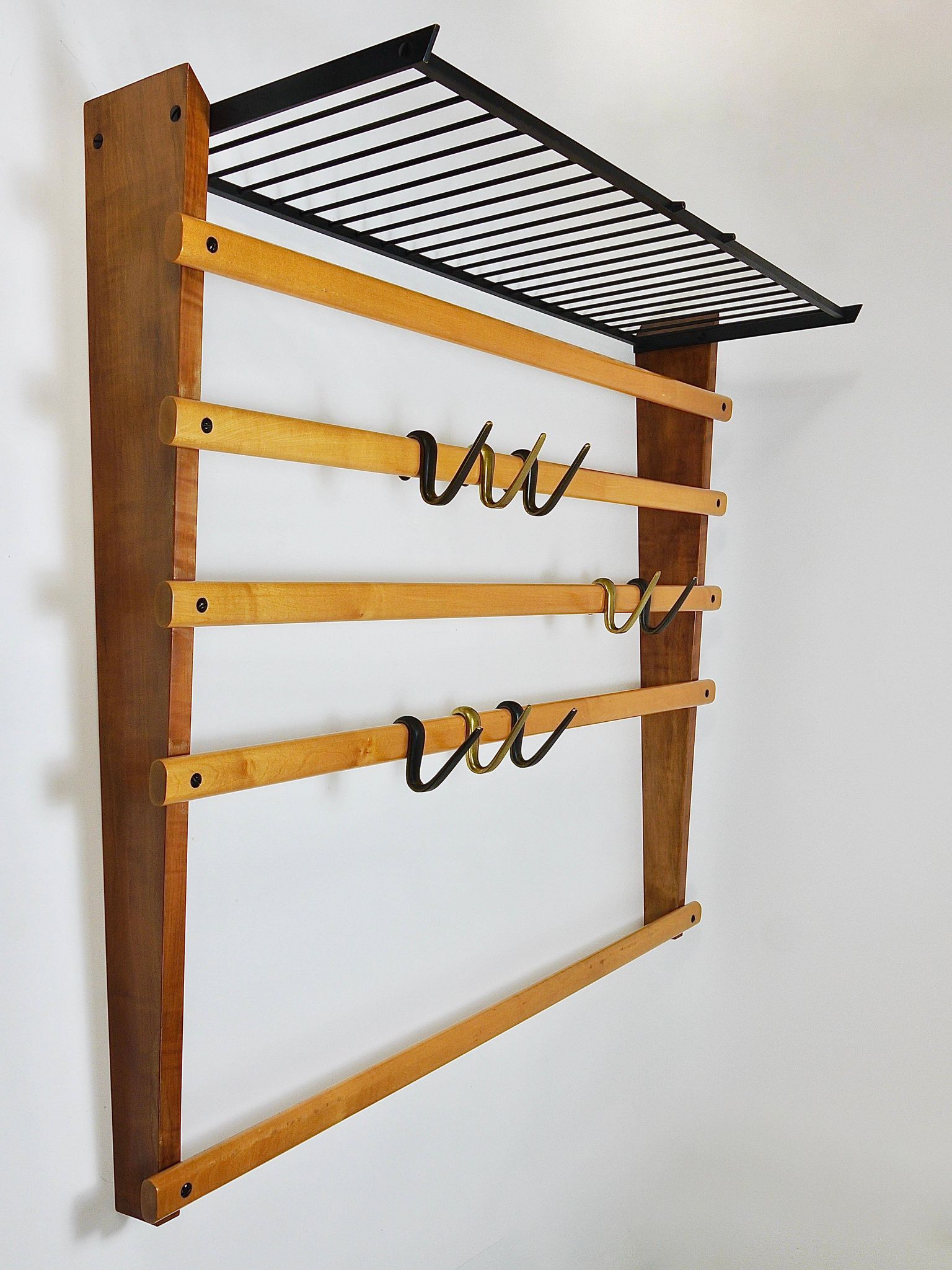 Rare coat rack by Carl Auböck with hat rack, cabinet, brass, walnut and beech, 1950s.