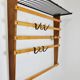 Rare coat rack by Carl Auböck with hat rack, cabinet, brass, walnut and beech, 1950s.