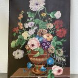 Peinture à l’huile sur bois fleurs signée Grumet