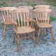 Set de 4 chaises et 1 fauteuil style montagne en chêne