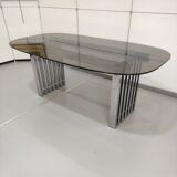 Chrome base diningroom table with smoked glass oval top