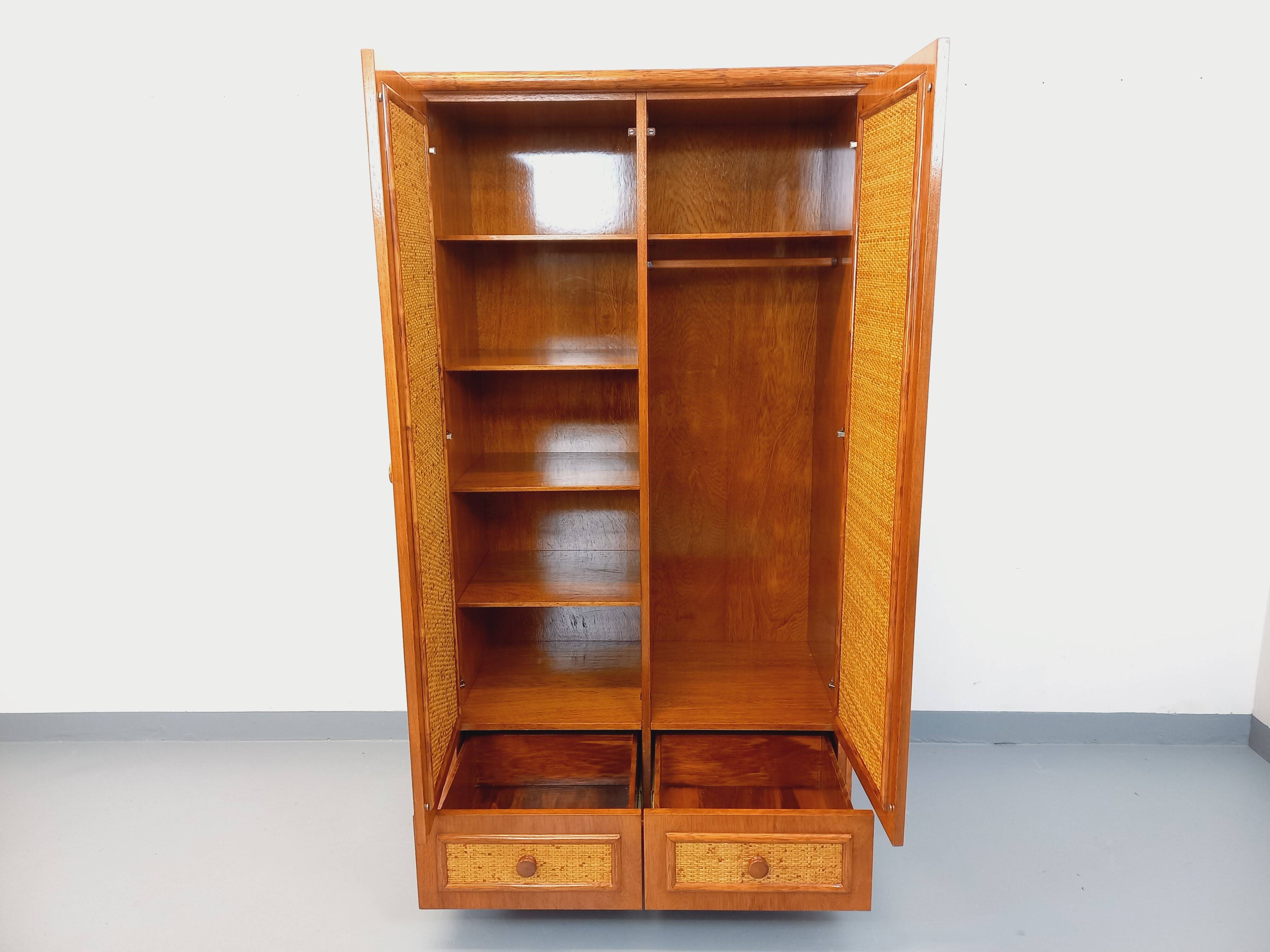 Vintage woven rattan and wood armoire by Maugrion for Roche-Bobois.