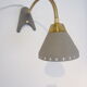 Scandinavian articulated lamp EWÅ for table or wall mounting.