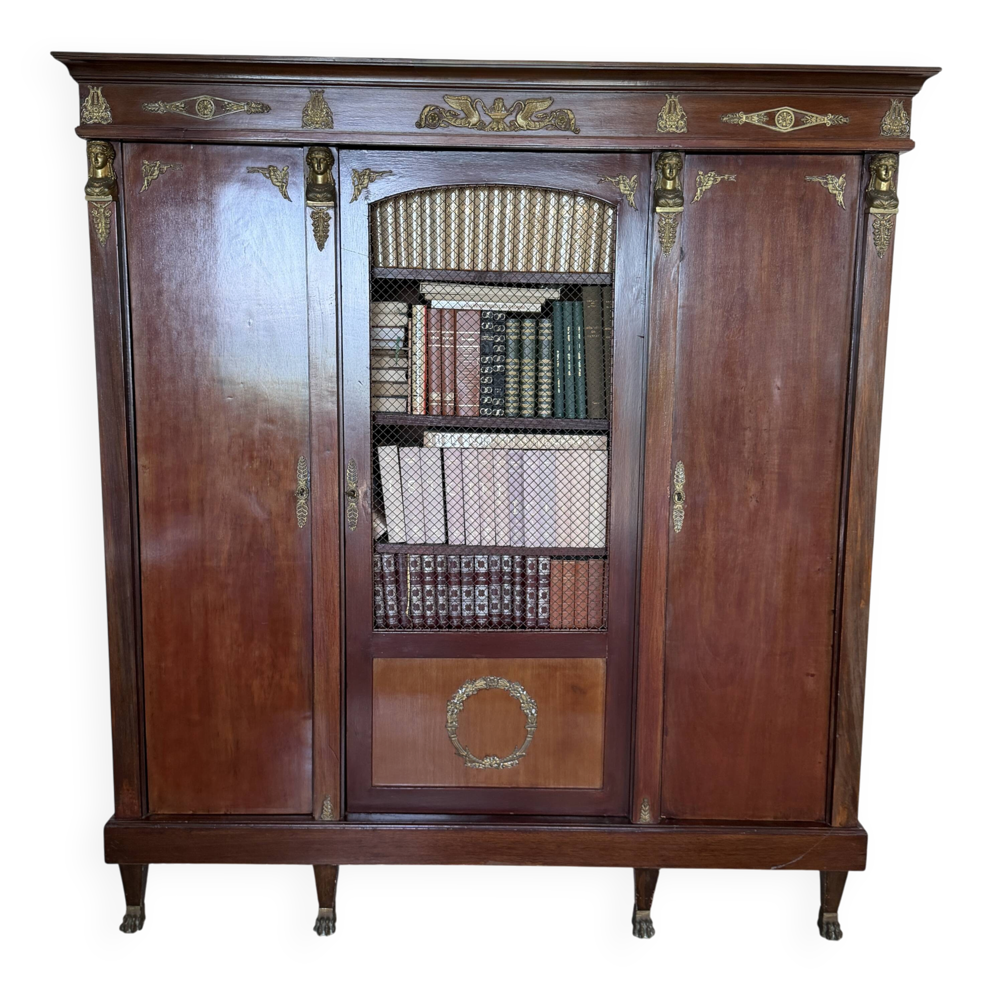 Large antique library from the Empire/Napoleon III period in mahogany and gilded bronze.
