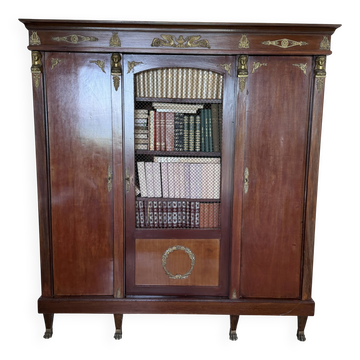 Grande bibliothèque ancienne Empire / Napoléon III en acajou et bronze doré