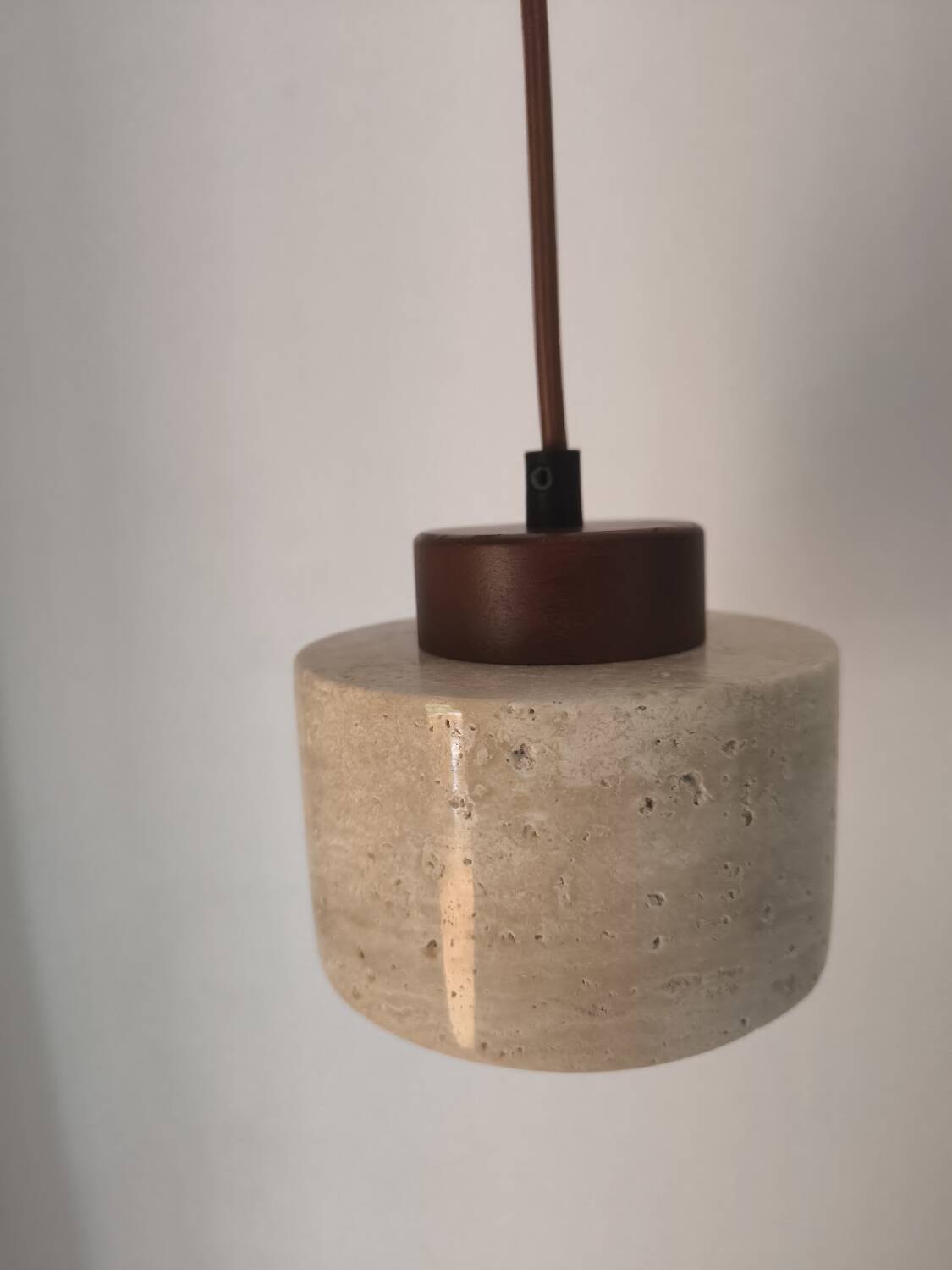 Travertine suspension