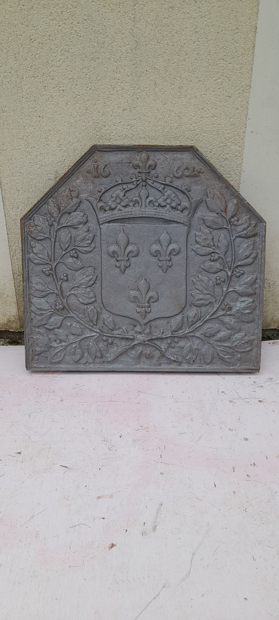 Plaque de cheminée  en fonte fleur de lys fonderie d'art jamais posée