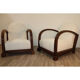 Pair of modernist armchairs in wood and buckle fabric, 1940