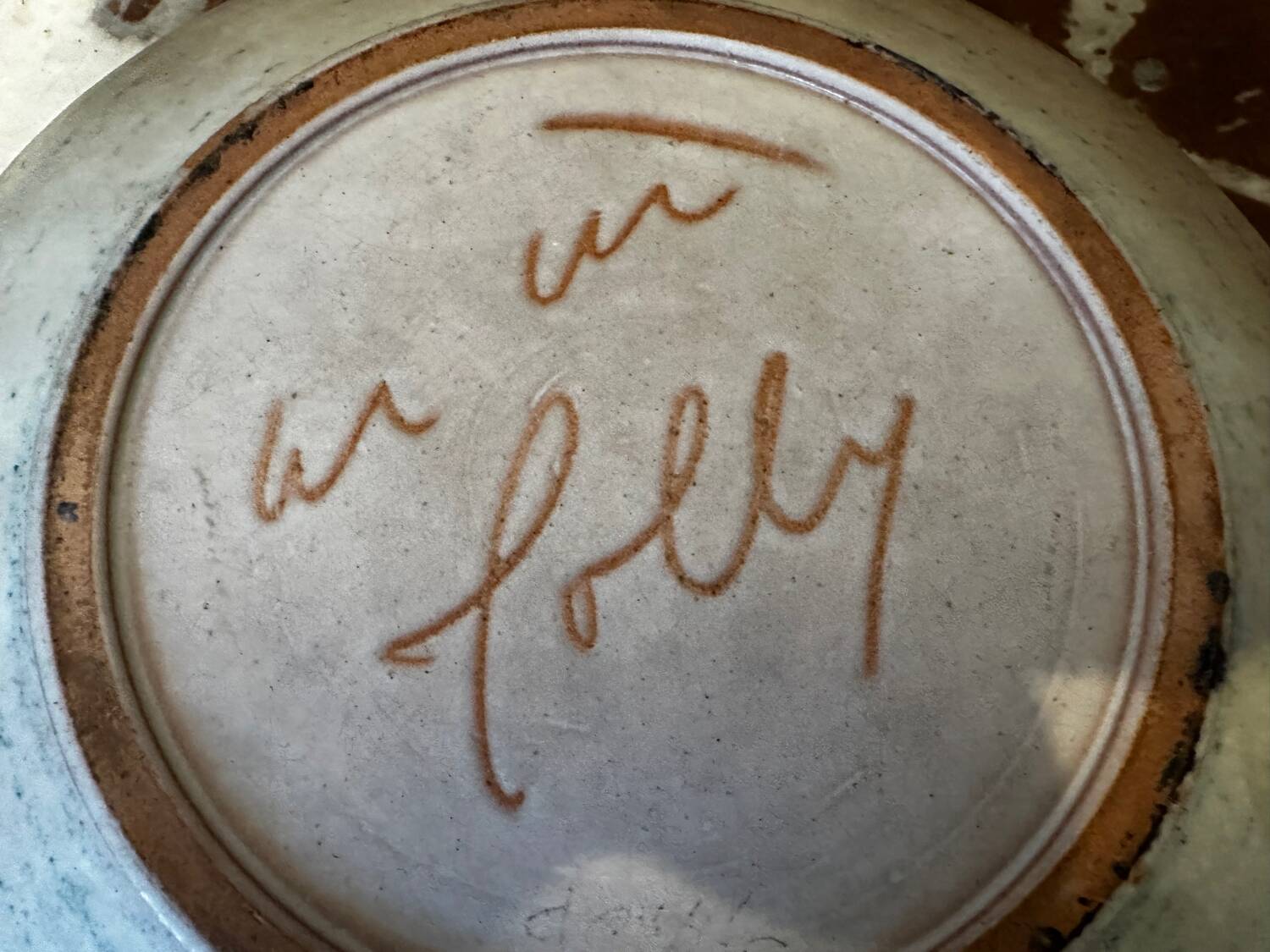 Ceramic plate signed by Marie-Madeleine Jolly – thistle decoration – year