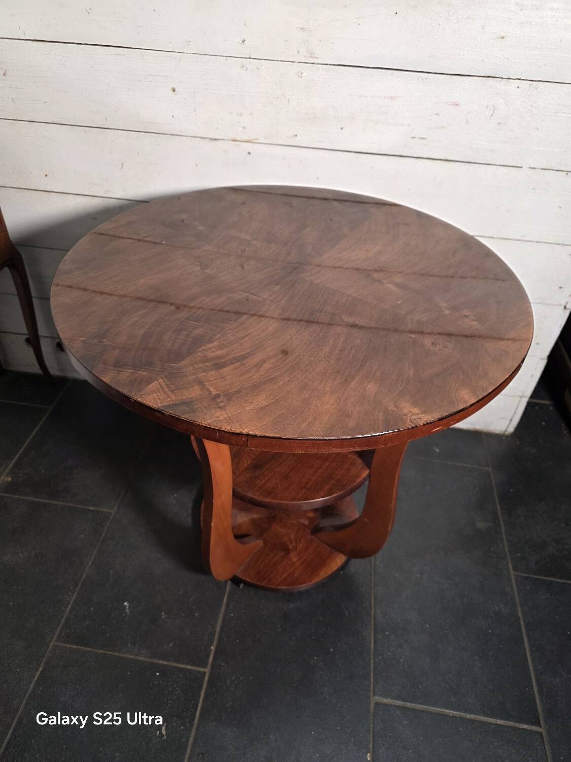 Art Deco walnut gueridon with double top from the 1930s.