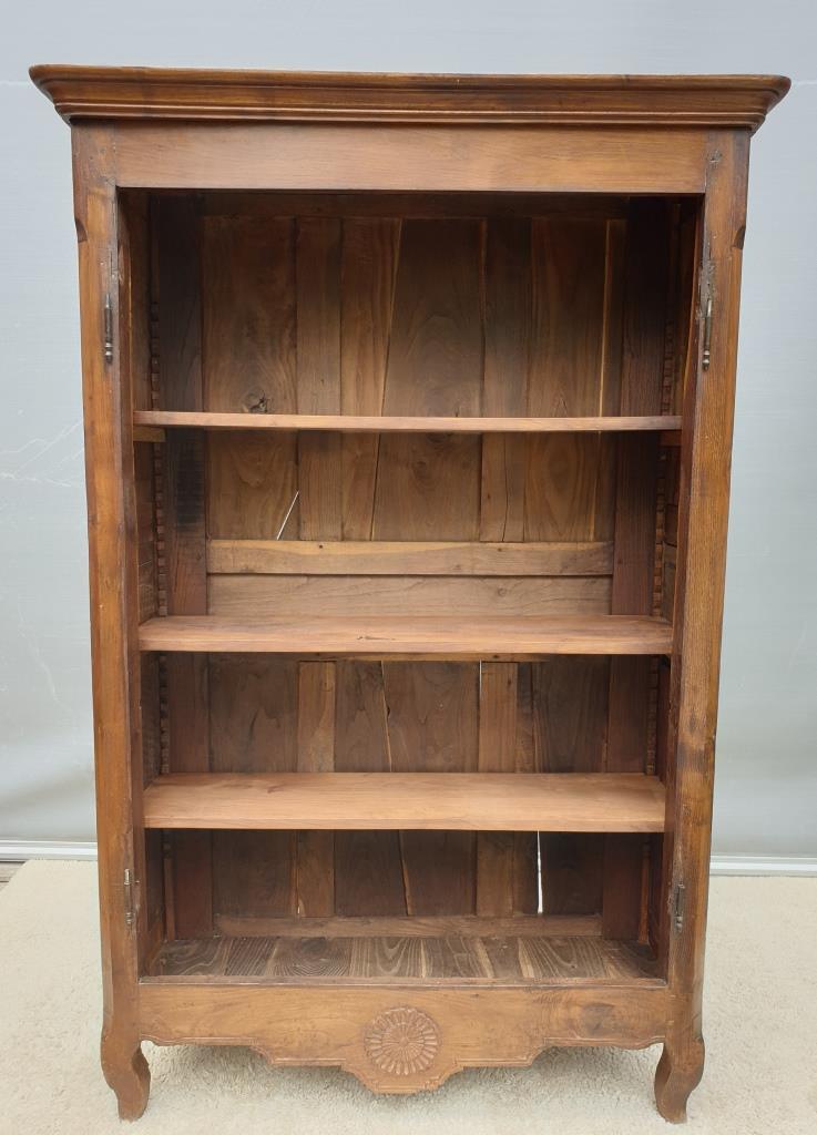 Walnut glazed bookcase with nineteenth century rose window