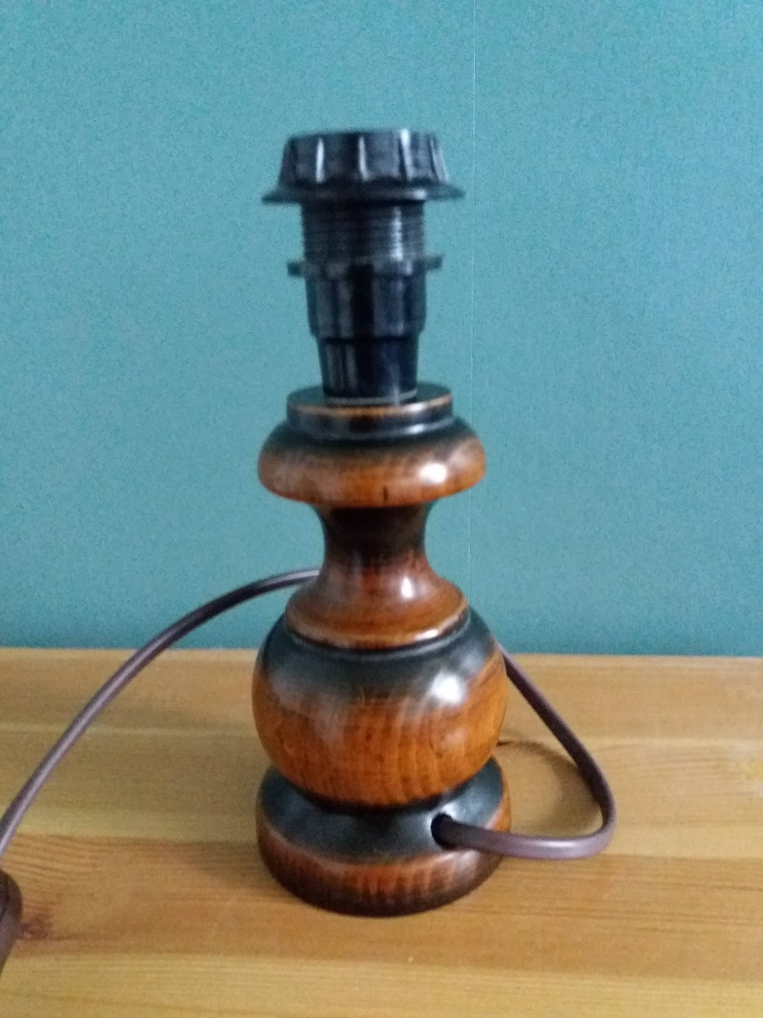 Turned wood bedside lamp with fabric lampshade