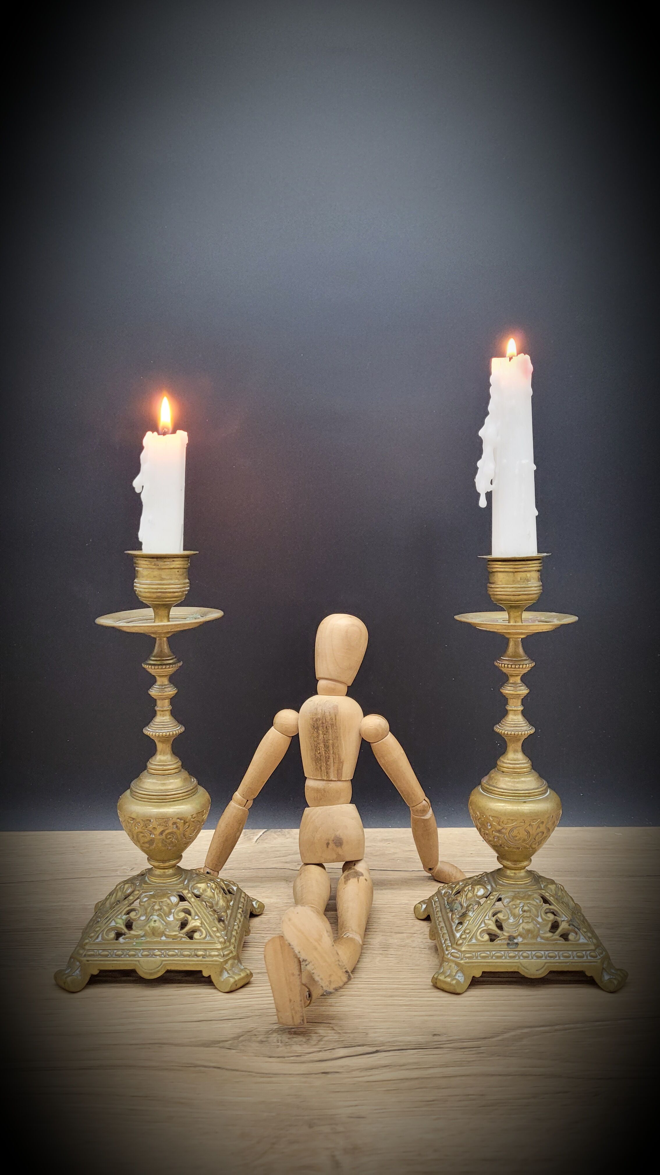 Duo worked brass candle holders
