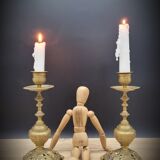 Duo worked brass candle holders