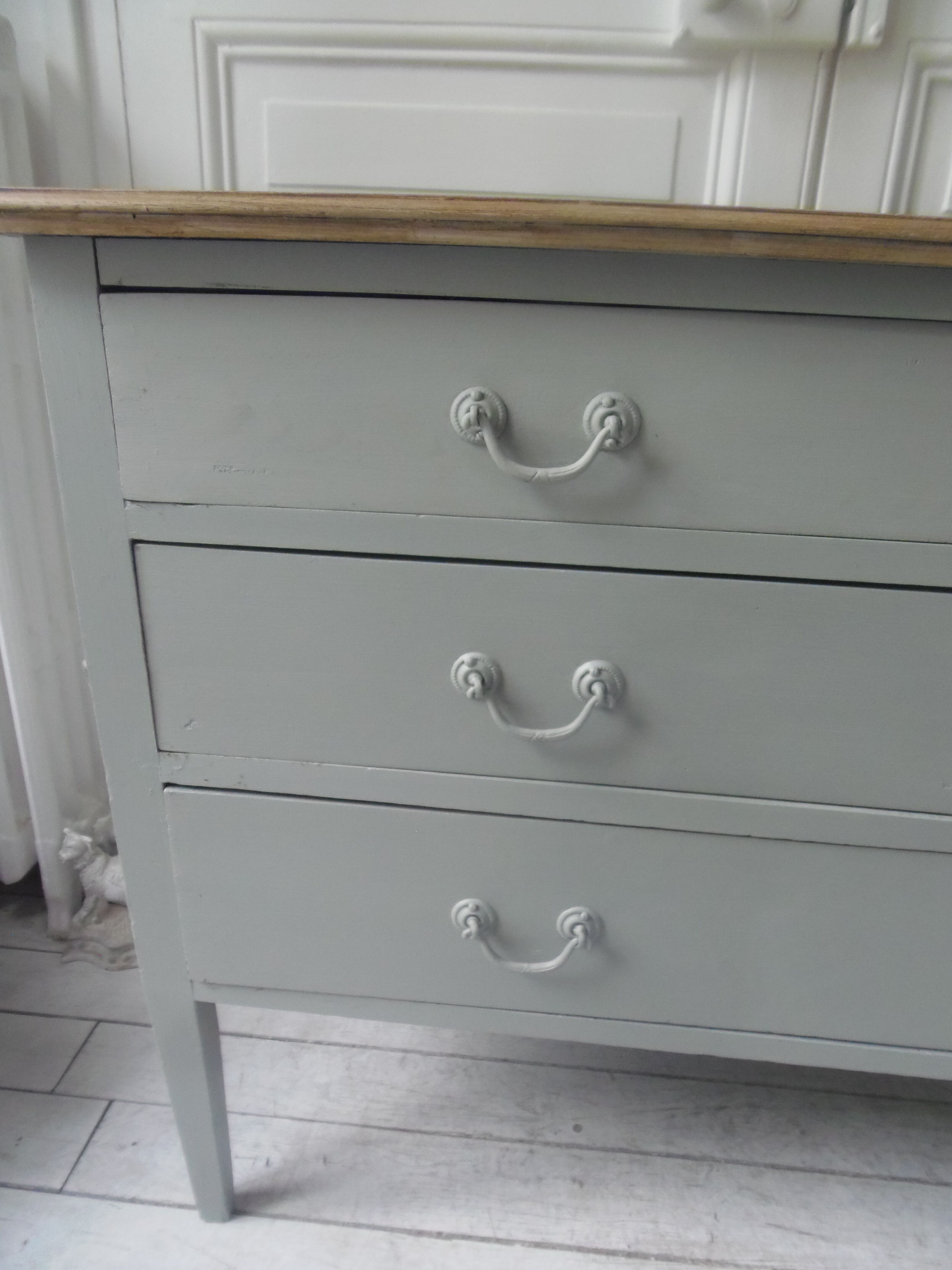Green green vintage chest of drawers of gray, wood top.