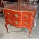 Curved jump commode in Louis XV style with marquetry and gilded bronzes.