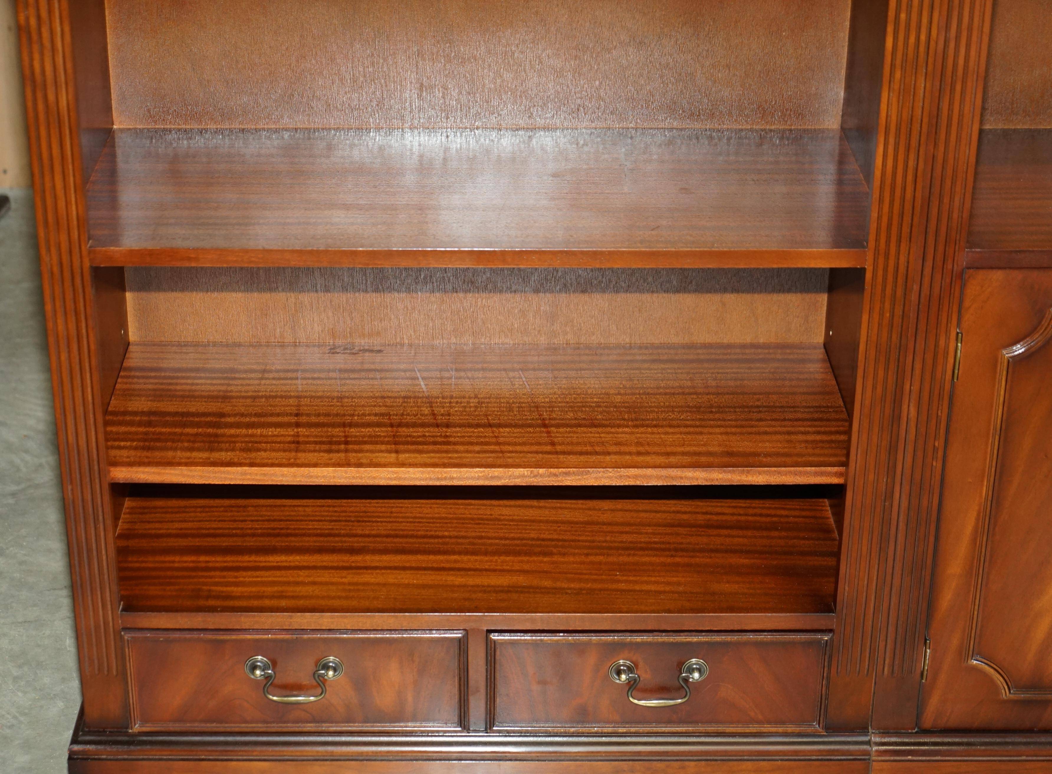Corner library made of flamed hardwood, in 3 parts.
