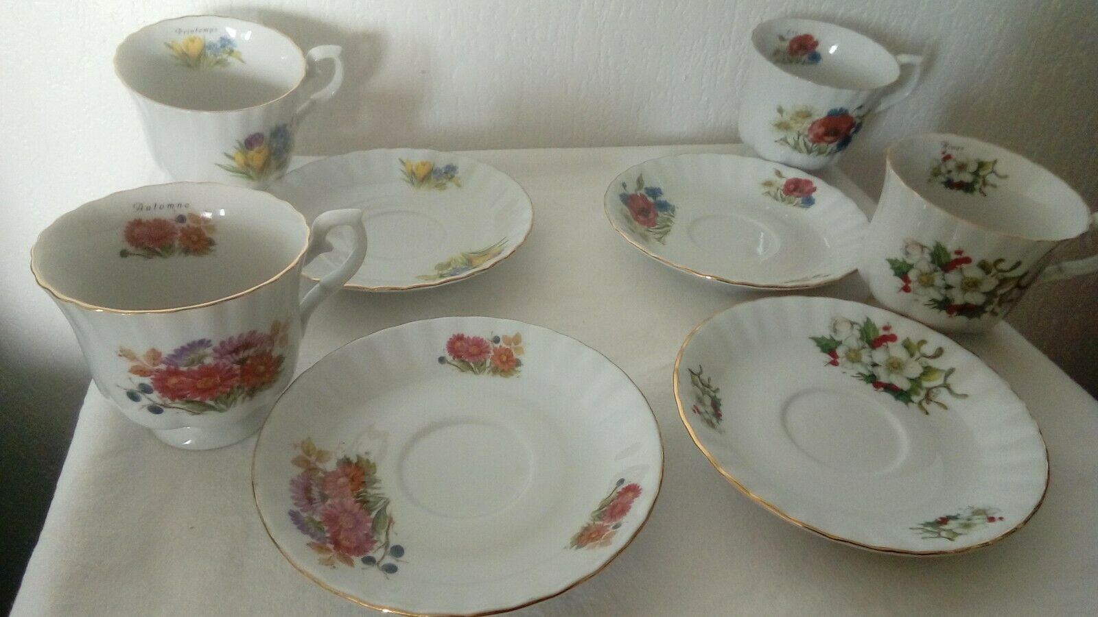 4 porcelain coffee cups on the theme of the 4 seasons