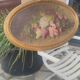 Elliptical table still life bouquet of flowers oil on wood by Lillie Honnorat