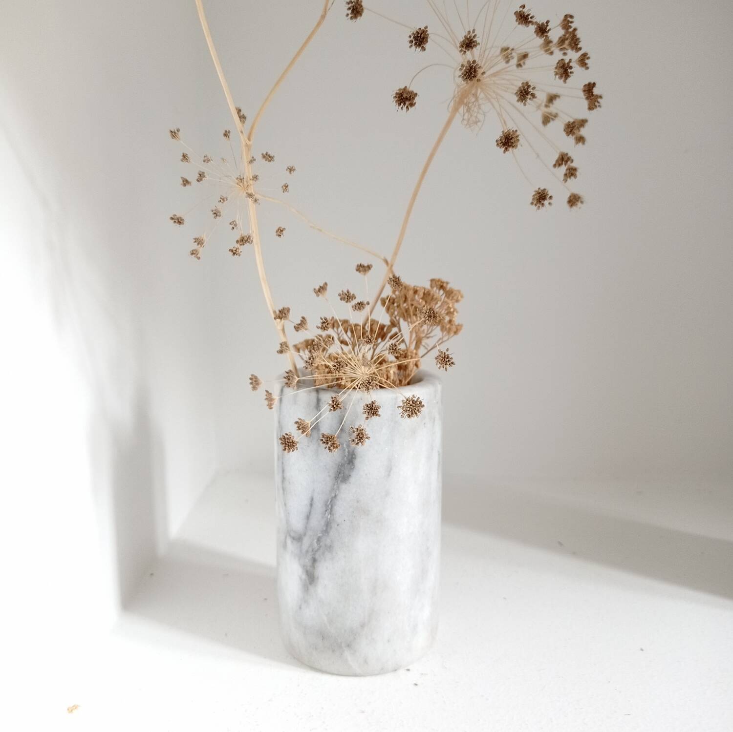 Cylindrical marble vase