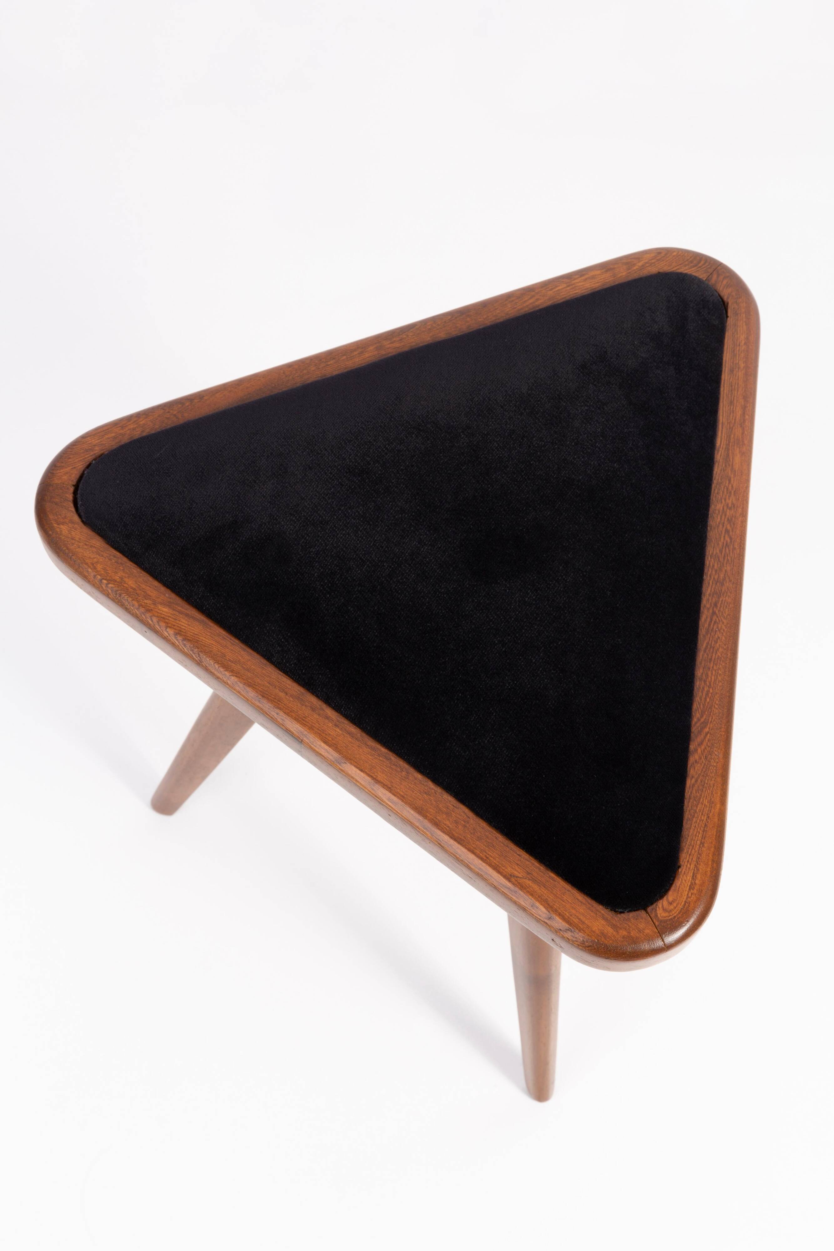 Set of two triangular stools in black and white velvet, Europe, 1960s.