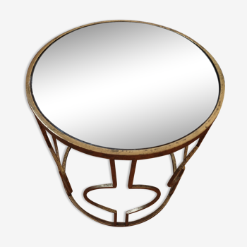 Round coffee table in glass and brass