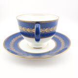 Antique Wedgwood teacup and saucer, bone china. Powder blue and gold English footed cup and saucer,