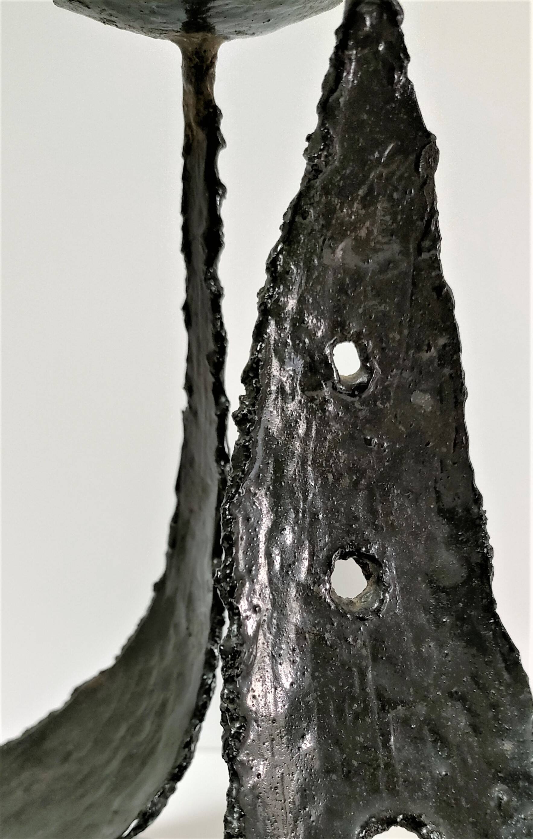 Pair of brutalist design metal candlesticks