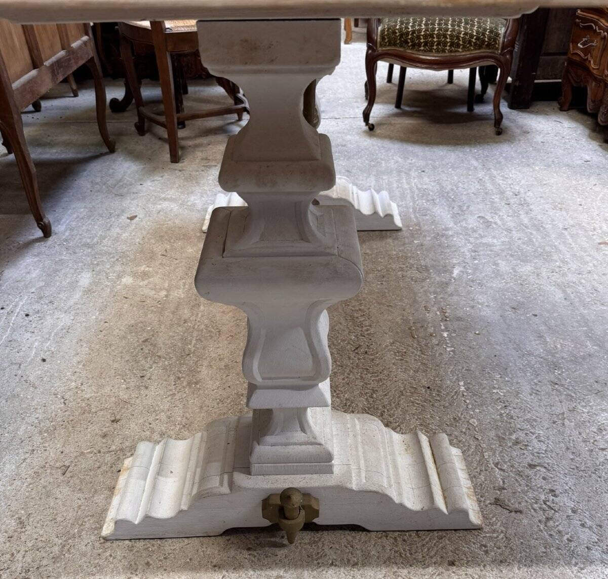 Industrial table with sandblasted top and bleached legs.
