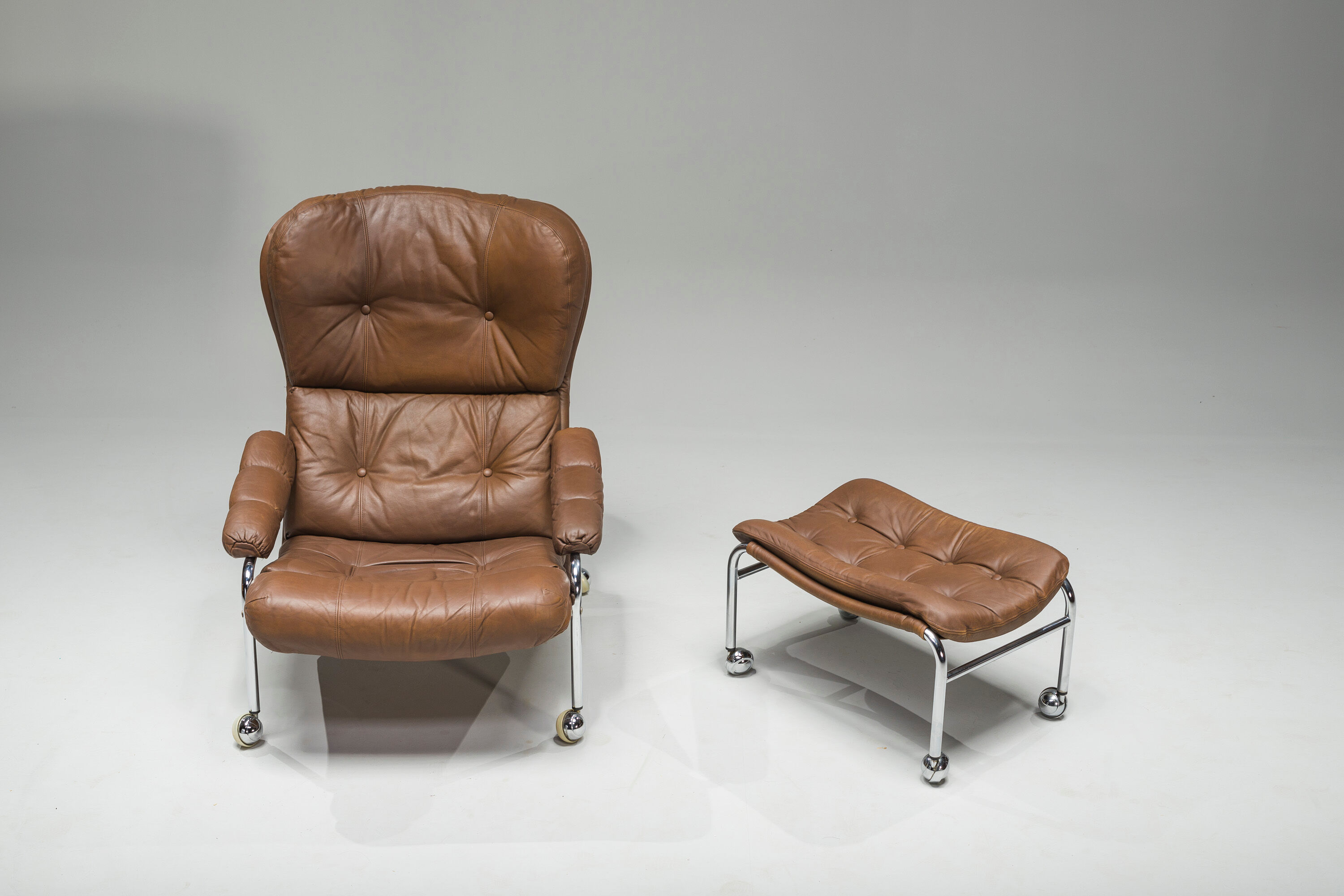 Swedish Lounge Chair and Ottoman in Chrome and Brown Leather by Scapa Rydaholm, 1960s, Set of 2