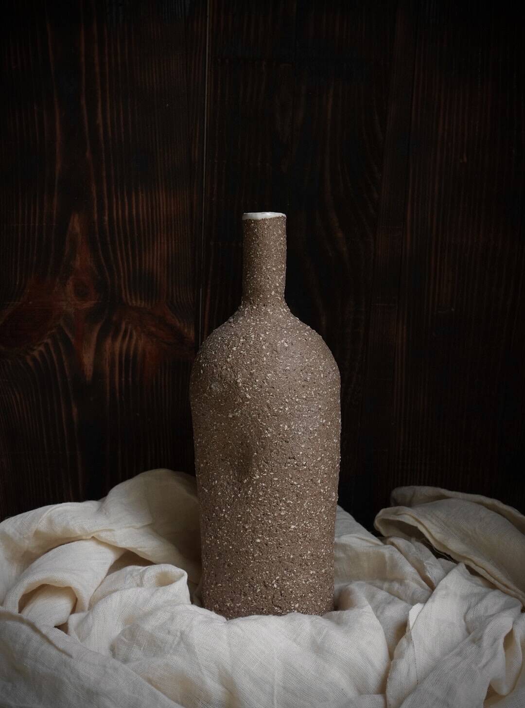 Ergonomic stoneware oil bottle