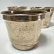 Three pot covers brass silver cover golden patina monogram early twentieth century
