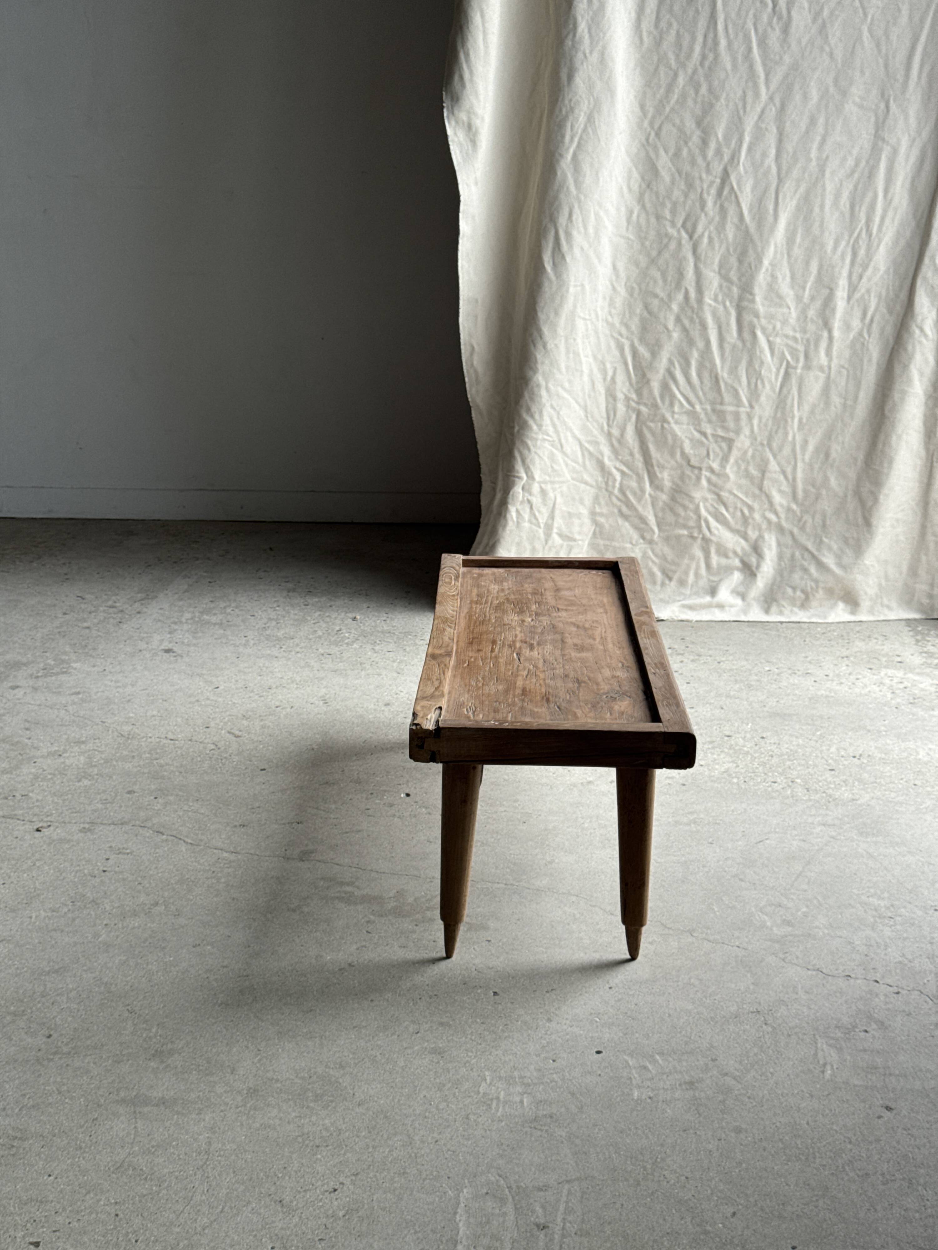 Coffee table with tapered legs in recycled antique teak H35 L104
