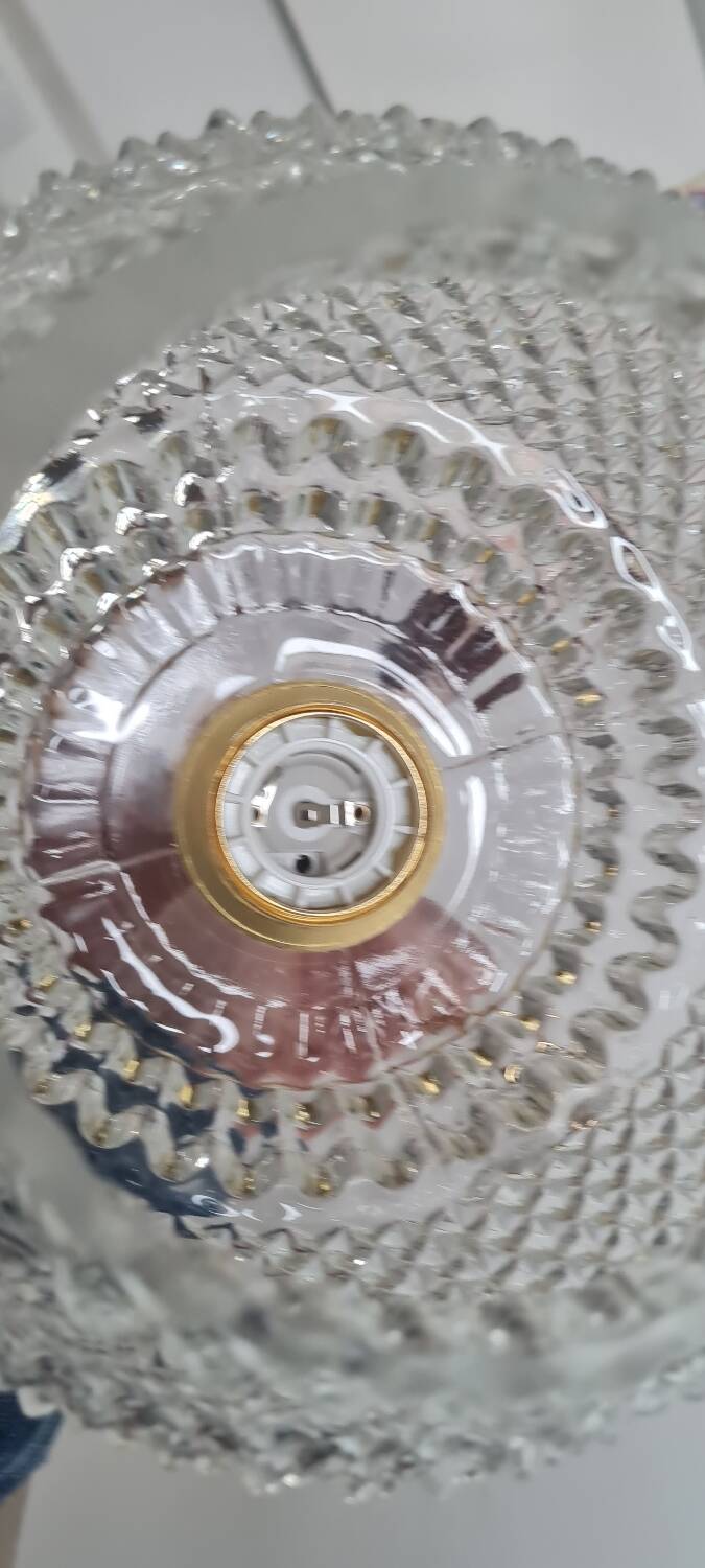 Pair of chiseled glass sconces