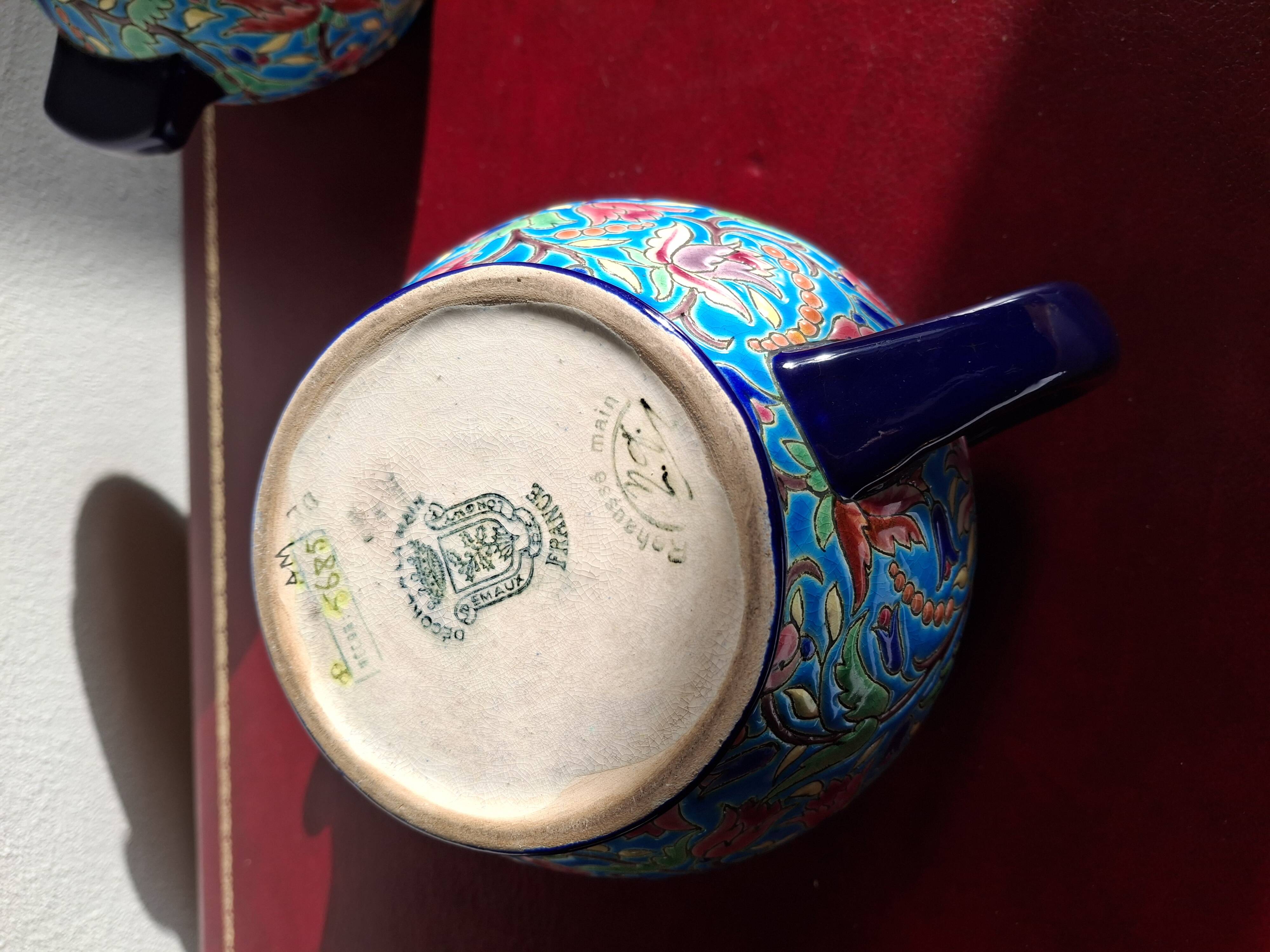 Cloisonné enamel tea service from Longwy in excellent condition.