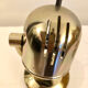 Vintage Fase adjustable wall lights in gold metal.