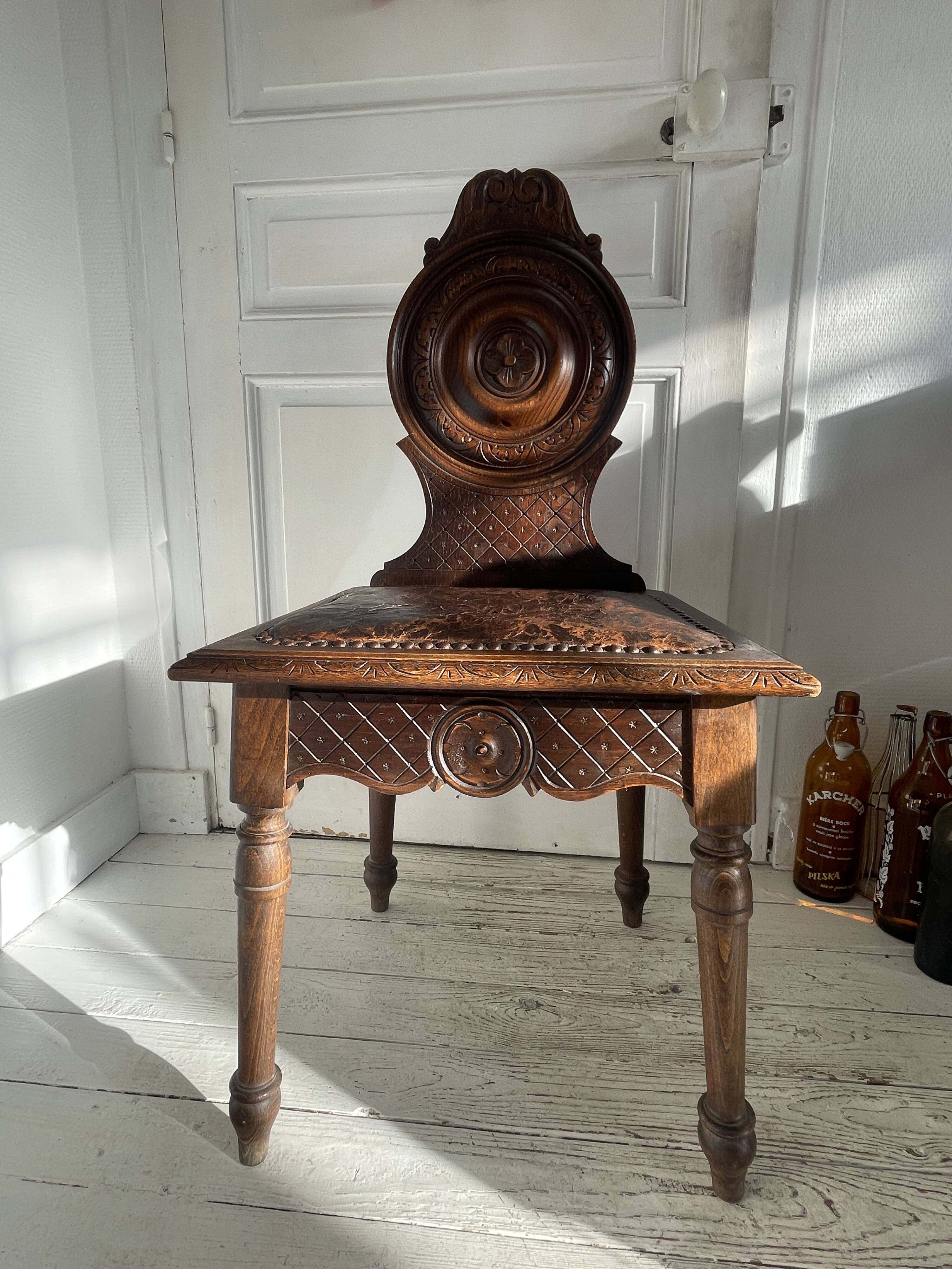 Wooden chair with Breton leather seat