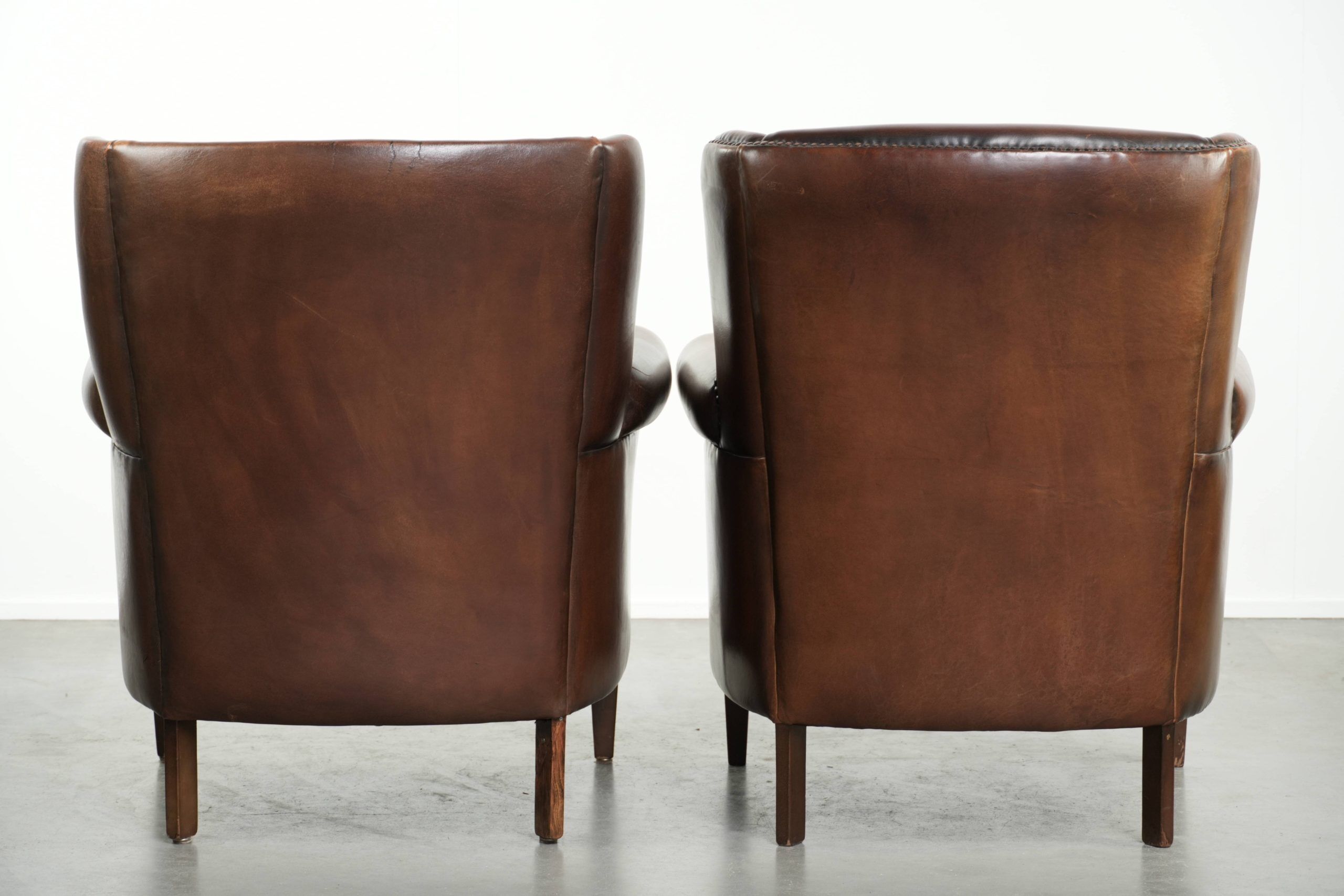 Set of 2 subtle sheepskin wingback armchairs in English style
