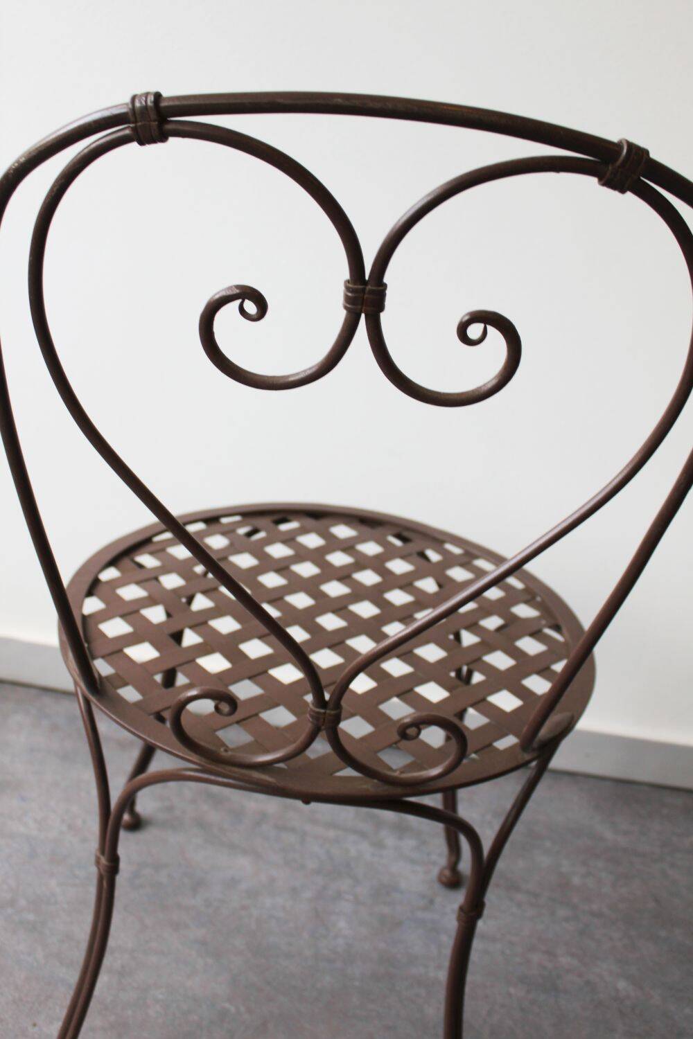 Set of 4 wrought iron chairs.