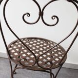 Set of 4 wrought iron chairs.