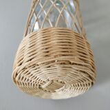 Glass and rattan bottle