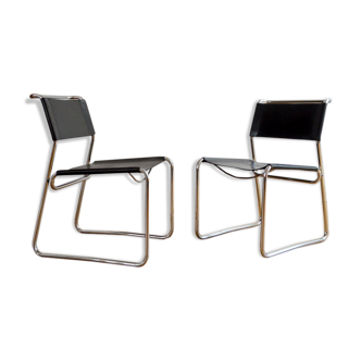 Pair of chrome metal and vintage leather chairs